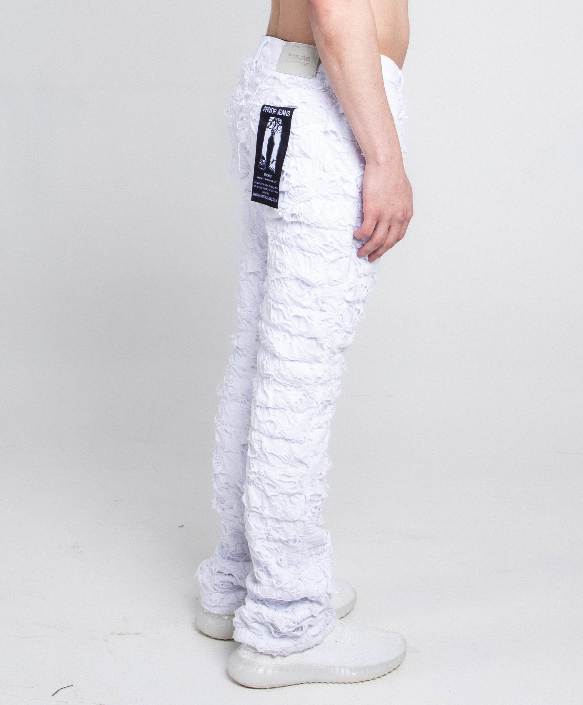 AR704 WHITE FRAYED STACKED JEANS